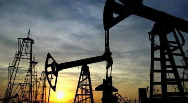 Oil halts slide near $51 as concerns persist over supply glut