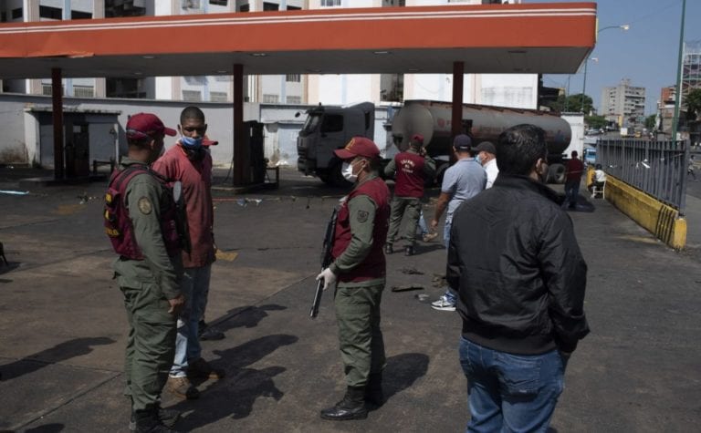 Soldiers protecting last drops of gasoline in Venezuela